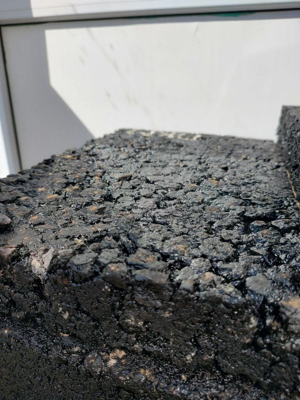 Core samples of SMA-20 with Veleton MPC after paving on Mangilik El Avenue