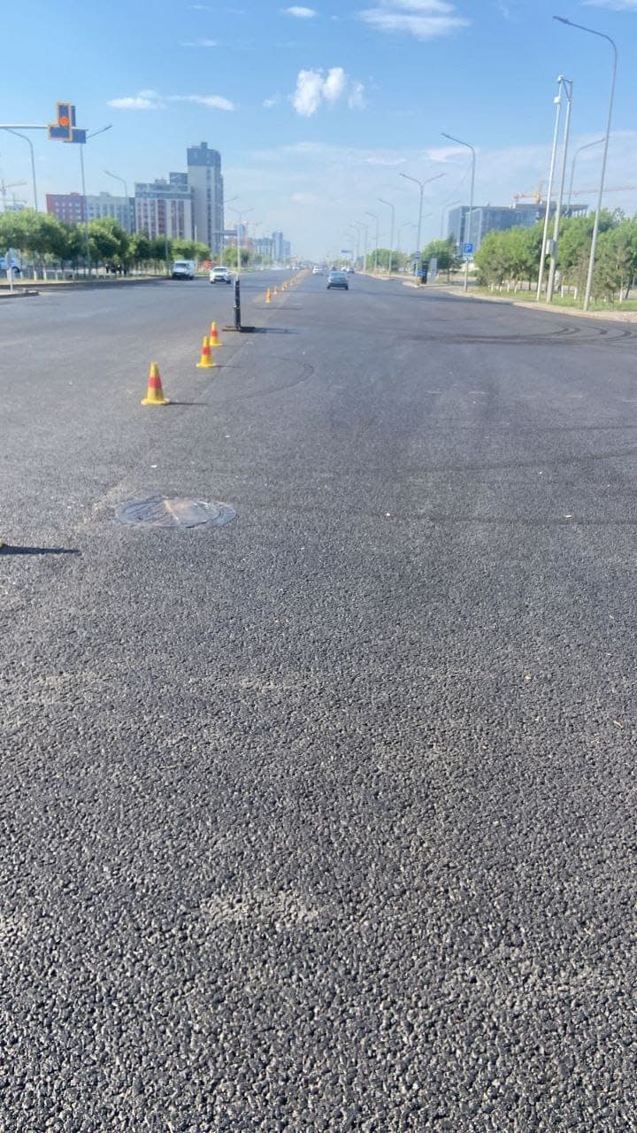 Finished pavement on Turan Avenue after laying SMA-20 with Veleton MPC