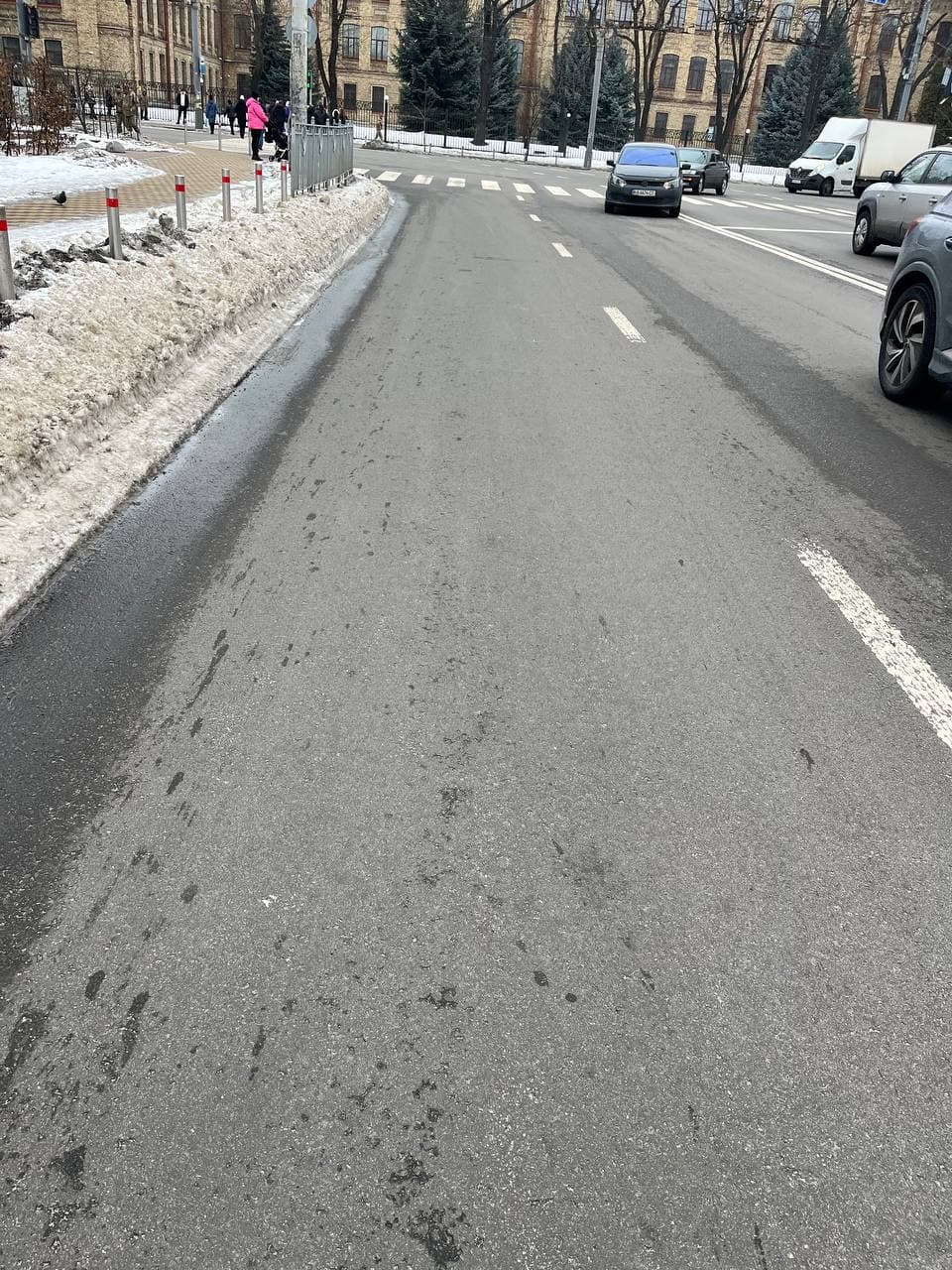 Pavement condition before the repair, ruts at the pedestrian crossing